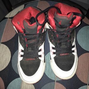 Black white and red Jordan’s